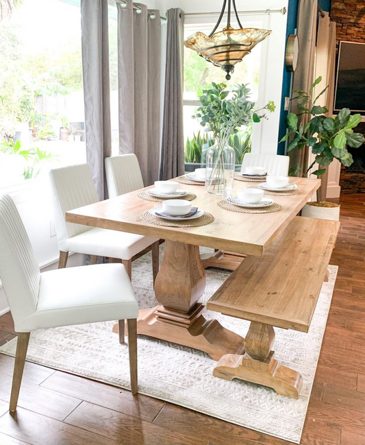 Handcrafted modern pedestal dining table in solid wood. Timeless farmhouse style with customizable sizes and finishes for any home.