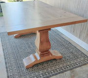 Handcrafted modern pedestal dining table in solid wood. Timeless farmhouse style with customizable sizes and finishes for any home.