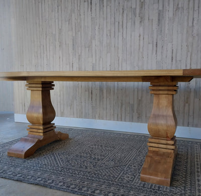 Handcrafted modern pedestal dining table in solid wood. Timeless farmhouse style with customizable sizes and finishes for any home.